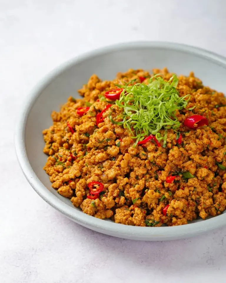 Delicious Thai Kua Gling - roasted spicy pork served with fragrant herbs.