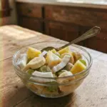 Delicious Pina Colada Fruit Salad with fresh tropical fruits and coconut.